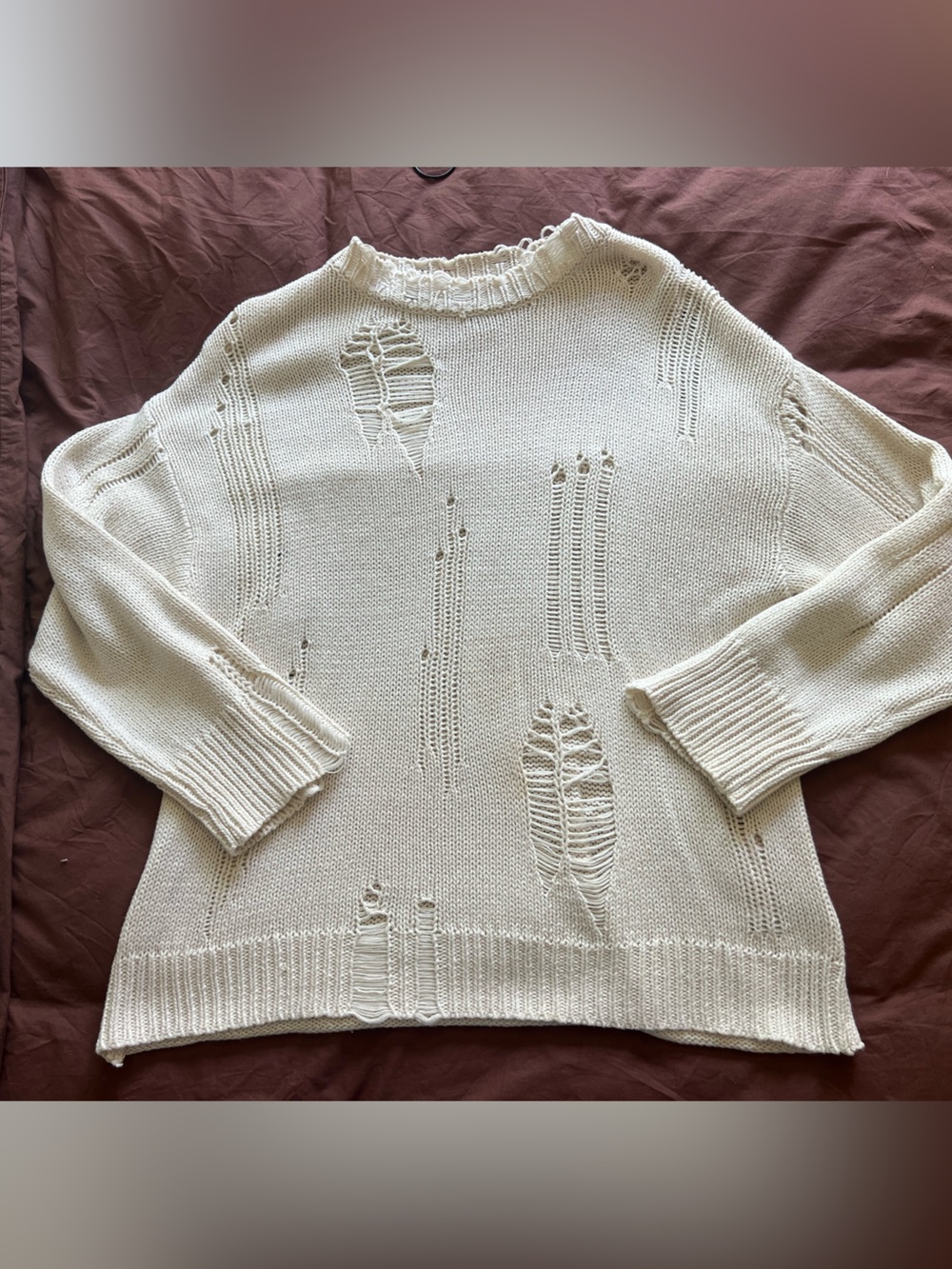 Urban Outfitters distressed sweater